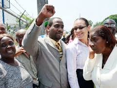 A jubilant Spencer and Wright after being freed by Judith Pusey