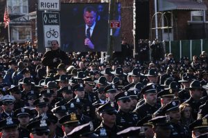 Cops turned their backs on a live video monitor showing New York City Mayor Bill de Blasio when he spoke at the funeral of slain NYPD officer Rafael Ramos near Christ Tabernacle Church in Queens.