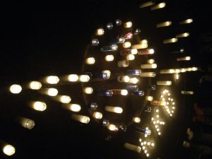 candles burn in honor of Kodi