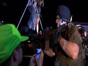 cops in Ferguson have weapons in the faces of peaceful protestors