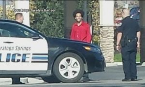 Hunt smiling with police before they gunned him down