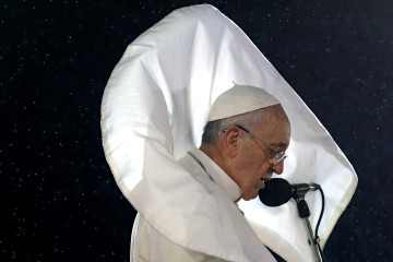 Pope Francis addresses a World Youth Day crowd on Rio de Janeiro’s Copacabana Beach on July 25, 2013. His trip to Brazil was his first foray abroad since being elected in March