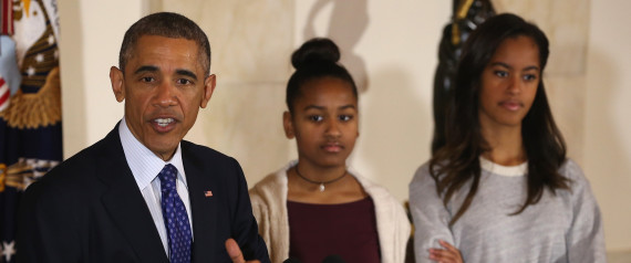  U.S. President Barack Obama speaks as his daughters Sasha and Malia look on before pardoning 'Cheese' and his alternate Mac both, 20-week old 48-pound Turkeys, during a ceremony at the White House November 26, 2014 in Washington, DC. The Presidential pardon of a turkey has been a long time Thanksgiving tradition that dates back to the Harry Truman administration.(Photo by Mark Wilson/Getty Images) | Mark Wilson via Getty Images