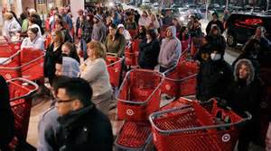 people stand in line to enter Target store