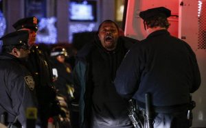 A man is arrested by police as he takes part in a protest on 6th Avenue in Manhattan after a grand jury decided not to indict New York Police Officer Daniel Pantaleo in Eric Garner's death on December 3, 2014 in New York City. (Kena Betancur/Getty Images) 