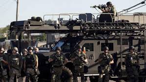 Equipment meant for the battlefield roll out in America cities to put down protest.