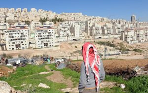 Israeli settlements on Palestinian land. Palestinian can only look on.