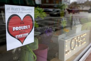 A window sign on a downtown Indianapolis florist, March 25, 2015, shows it's objection to the Religious Freedom bill passed by the Indiana legislature. Photo by Michael Conroy/AP