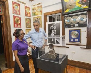 U.S. President Barack Obama visits the Bob Marley Museum with tour guide Natasha Clark.