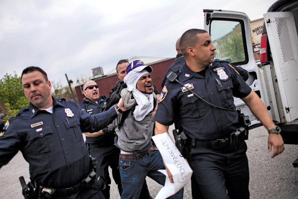 In Baltimore Gov.thugs confiscate posters an terrorize citizens who are exercising the constitutional rights