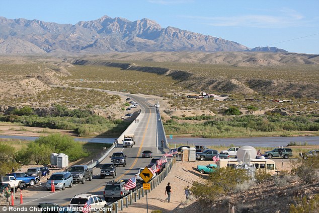Fanatical: The edge of a Cliven Bundy supporter camp is shown near the Virgin River Saturday, April 12, 2014, near Bunkerville, Nevada Read more: http://www.dailymail.co.uk/news/article-2603026/Senator-speaks-favor-Nevada-rancher-militias-join-battle-federal-agents-accused-acting-like-theyre-Tienanmen-Square-fight-disputed-ranch-land.html#ixzz3Yi9oQTYz  Follow us: @MailOnline on Twitter | DailyMail on Facebook
