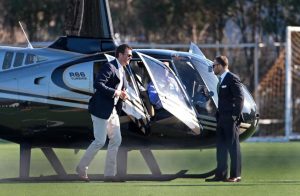  quarterback Tom Brady arrives by helicopter for a speaking event at Salem State