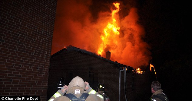 Flames: Pictured is the Briar Creek Road Baptist Church in Charlotte, North Carolina, which started burning Wednesday around 1am Read more: http://www.dailymail.co.uk/news/article-3142817/String-suspected-arson-attacks-SIX-black-churches-stretching-Georgia-Ohio-burned-single-week.