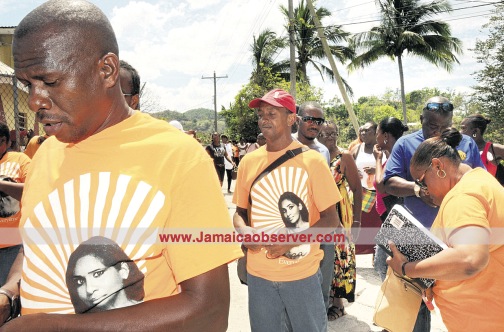 PNP delegates wait in line to vote yesterday.