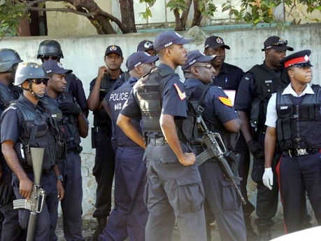 Officers converge on a crime scene in east kingston