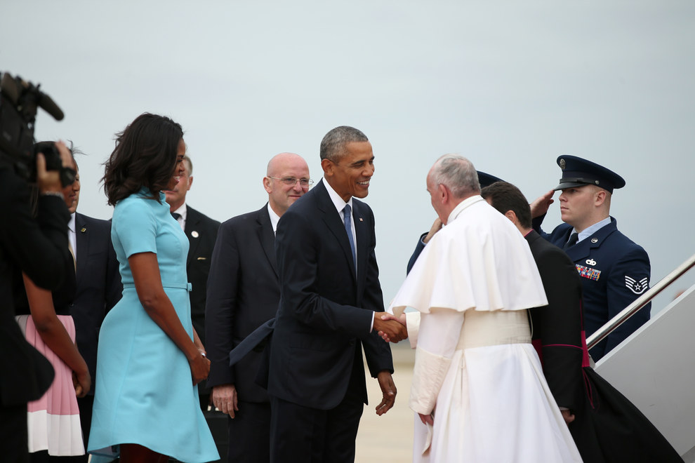 President Obama ,first Lady Michelle Obama and their two daughters greets the Pope ..