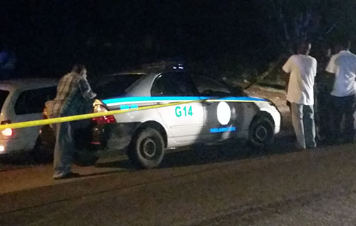 The scene on Carey Park main road in Trelawny where a taxi driver was shot dead and a policewoman shot and injured. (Photo: Mark Cummings)