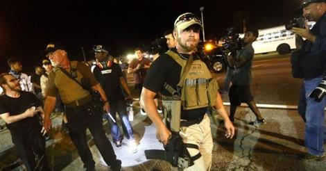 Open Carry Vigilantes Terrorize Ferguson Protester