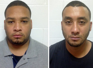 In this photo combination shows booking photos provided by the Louisiana State Police, Marksville City Marshal Derrick Stafford, left, and Marksville City Marshal Norris Greenhouse Jr., both were arrested on charges of second-degree murder and attempted second-degree murder in the fatal shooting of Jeremy Mardis, a six-year-old autistic boy, on Tuesday, Nov. 3, 2015 in Marksville, La. The shooting also wounded Mardis' father, Chris Few. (Louisiana State Police via AP) MANDATORY CREDIT