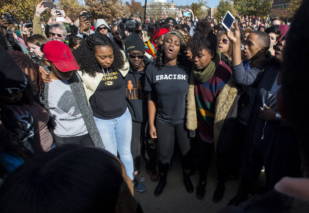 COLUMBIA, MO - NOVEMBER 9: Members of Concerned Student 1950 celebrate after the resignation of Missouri University president Timothy M. Wolfe on the Missouri University Campus November 9, 2015 in Columbia, Missouri. Wolfe resigned after pressure from students and student athletes over his perceived insensitivity to racism on the university campus. (Photo by Brian Davidson/Getty Images)