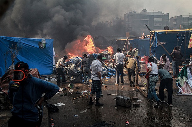 Protesters in the August 2013 Raba’a massacre, carried out by Sisi’s U.S.-backed coup government (Credit: Wikimedia Commons/Flickr/Mosa’ab Elshamy)