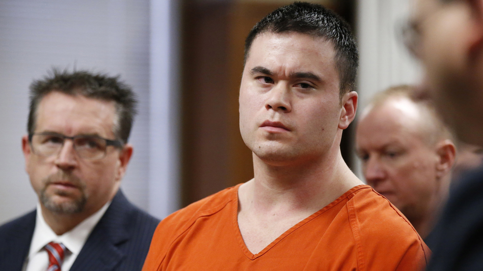 Daniel Holtzclaw (center) listens as Oklahoma County assistant district attorney Gayland Gieger (right) speaks during Holtzclaw's sentencing hearing in Oklahoma City, Thursday. Holtzclaw, a former Oklahoma City police officer, was convicted of raping and sexually victimizing several women on his beat. At left is defense attorney Scott Adams.
