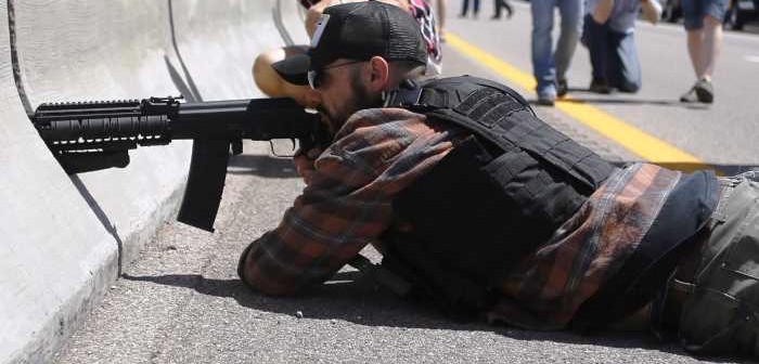 Bundy Militia-men take aim at Bureau of Land Management agents during standoff.