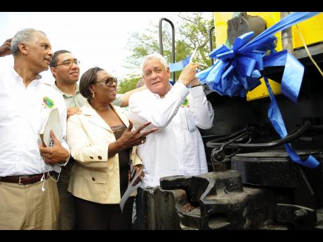 On April 16, 2011, Mike Henry (right), who was minister of transport and works at the time, launched the return of the railway system. The moment was shared with fellow government ministers Olivia ‘Babsy’ Grange and Andrew Holness, along with chairman of the Jamaica Railway Corporation, Barry Bonitto (left).