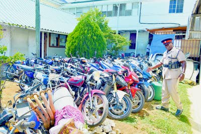 Police officer shows motorcycles to the media . Observer photo...