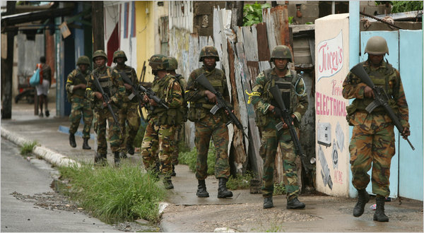 These soldiers are not in Afghanistan or Iraq , they are on patrol in Jamaica.