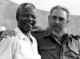 A grateful Nelson Mandela and Fidel Castro