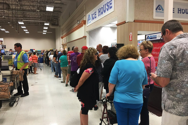 Clark County voters voters stand in line for hours..