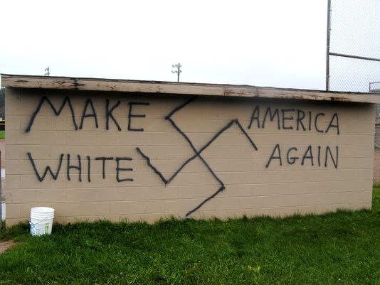 In Wellsville, N.Y., a massive swastika is scrawled on a park wall: "Make America White Again."